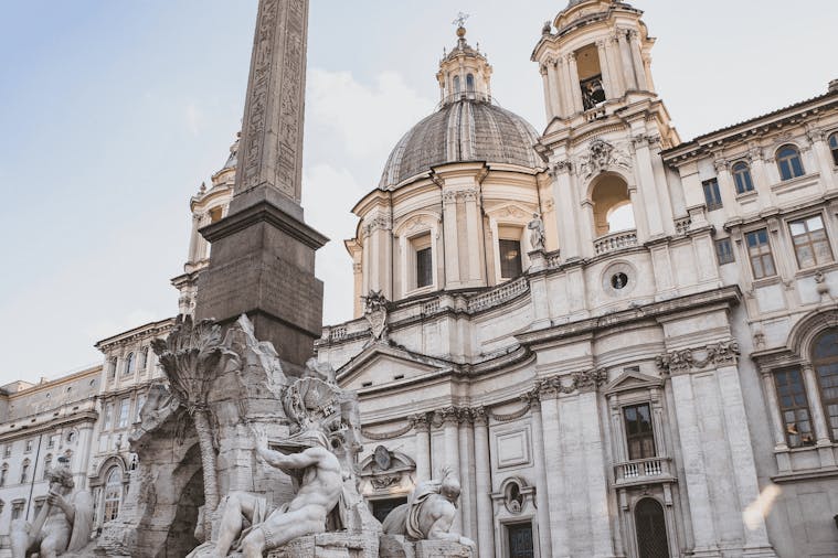 The vibrant atmosphere of Piazza Navona, famous for its fountains and architecture