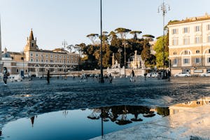 The lush greenery and pathways of Villa Borghese in Rome